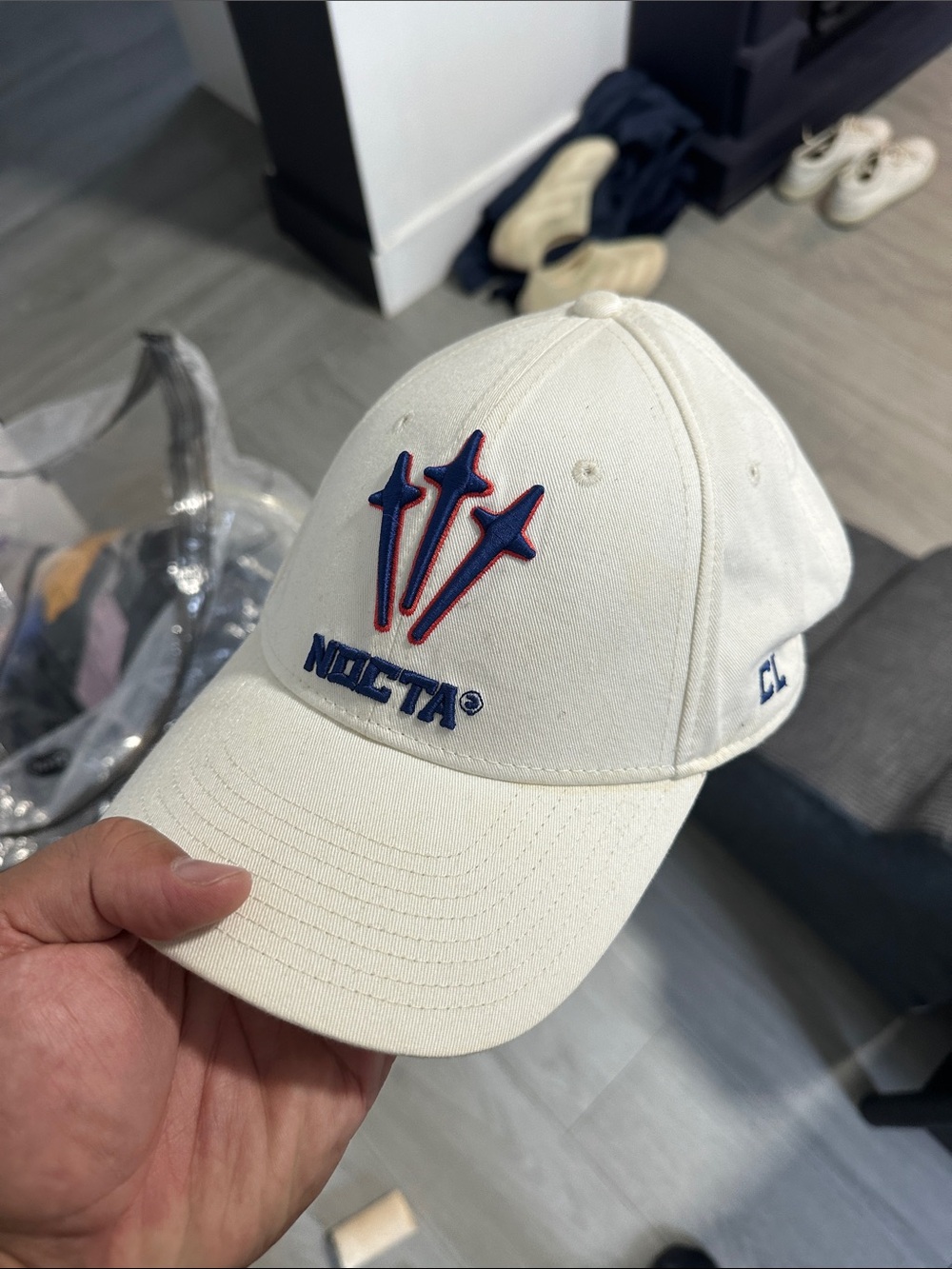 Nike White Baseball Cap with Blue and Red Embroidered Trident Logo